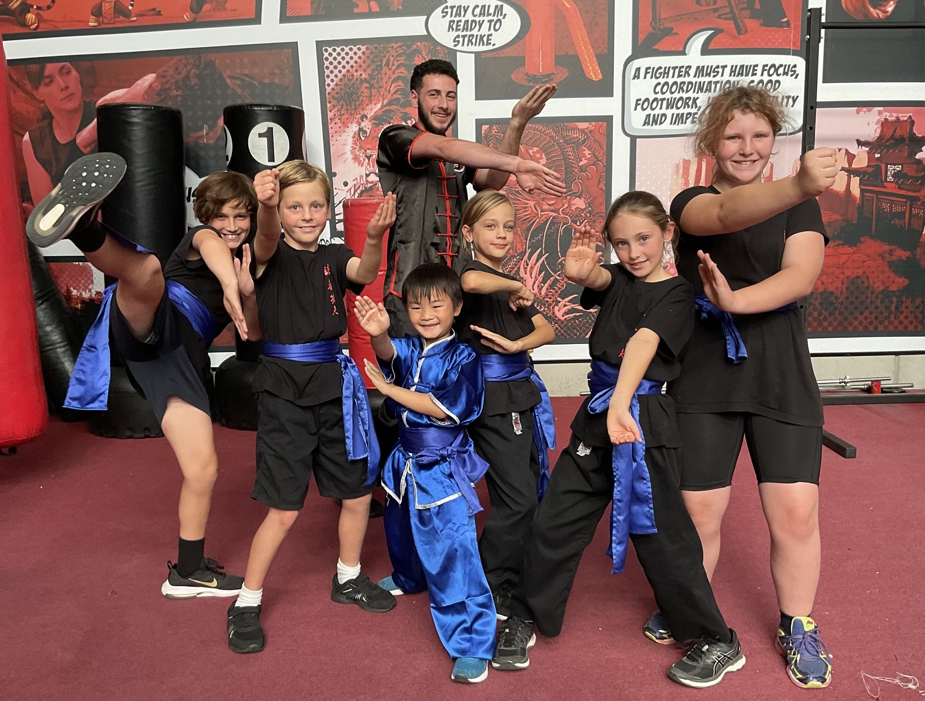 Children enjoying Wing Chun training with an instructor at the Mornington academy